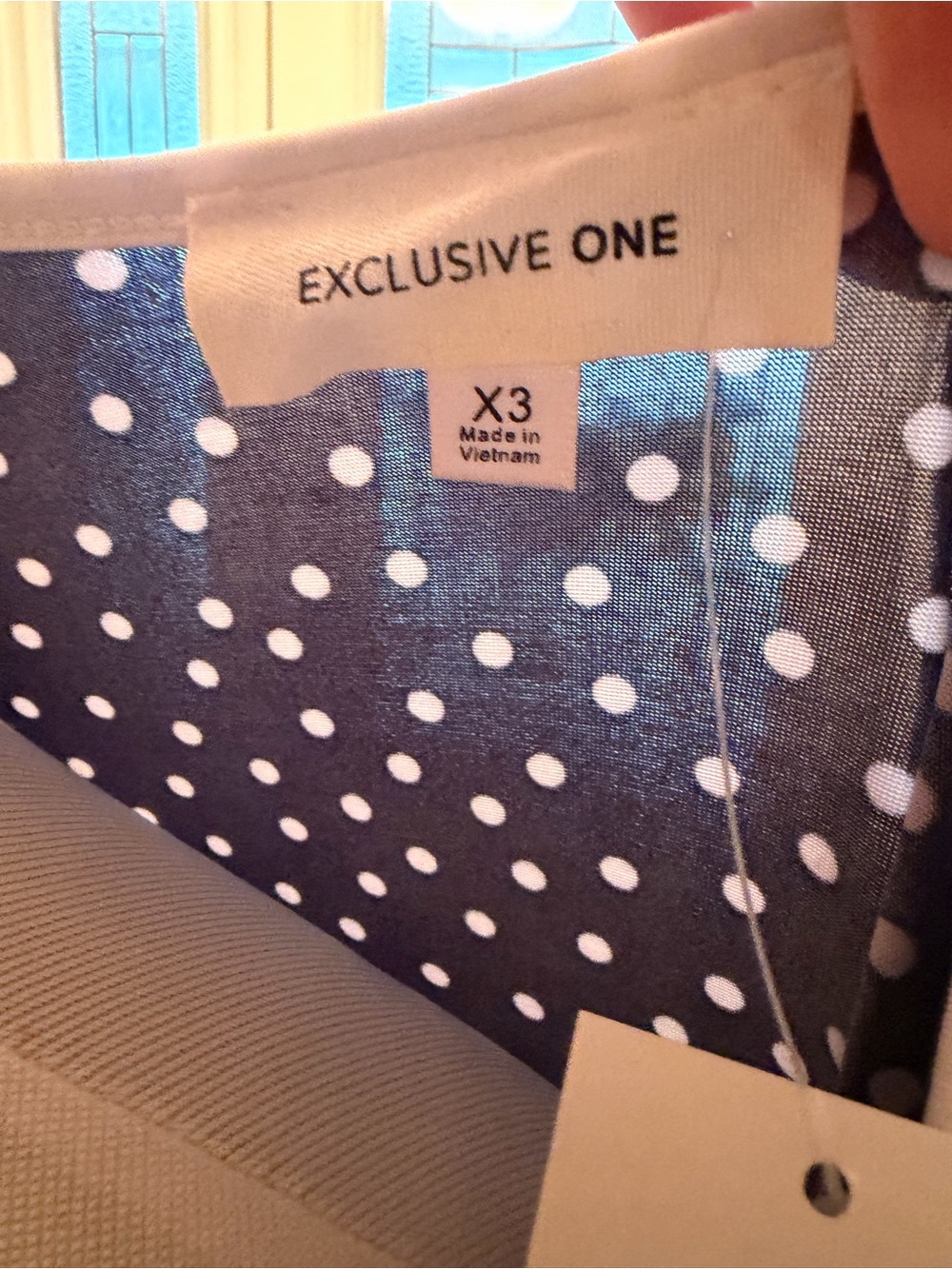 Exclusive One Navy Polka Dot Top with Keyhole Detail - Picture 5 of 5